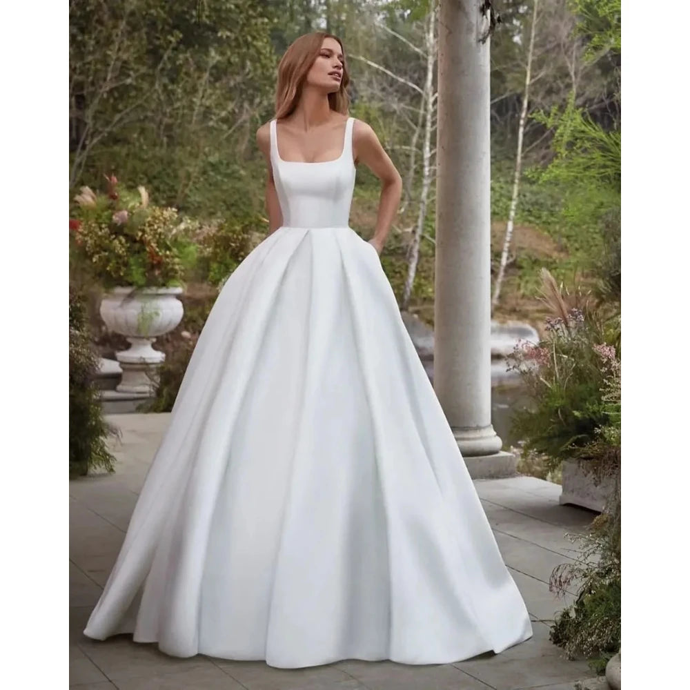 Simple Wedding Dress Customized Elegant Spaghetti Strap Square Neck Satin A Line Backless Sweep Train Bridal Gowns 2026