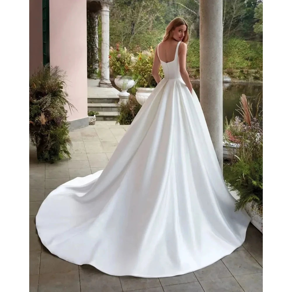 Simple Wedding Dress Customized Elegant Spaghetti Strap Square Neck Satin A Line Backless Sweep Train Bridal Gowns 2026