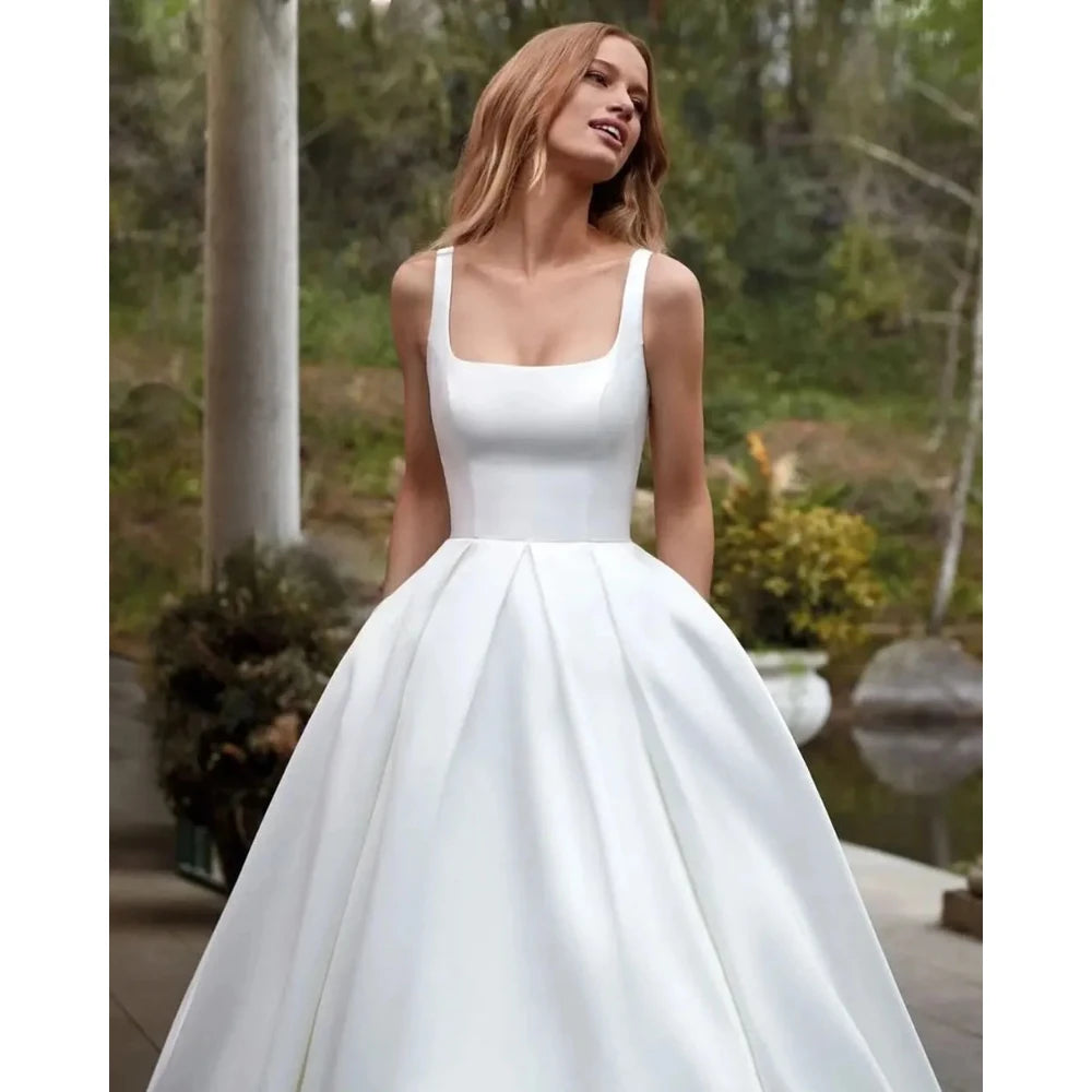 Simple Wedding Dress Customized Elegant Spaghetti Strap Square Neck Satin A Line Backless Sweep Train Bridal Gowns 2026
